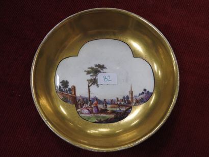 MEISSEN
Porcelain cup and saucer with polychrome...