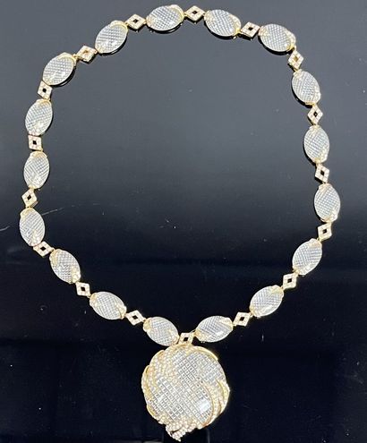 M. GERARD: Necklace in yellow gold 750 thousandths...