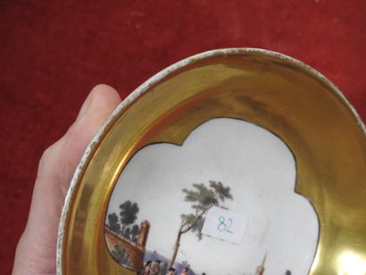 MEISSEN
Porcelain cup and saucer with polychrome...
