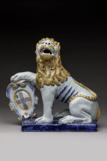 ROUEN: Seated polychrome earthenware lion,...