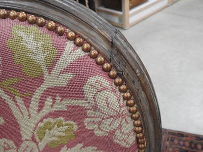 PAIR OF ARMCHAIRS in molded and carved natural...