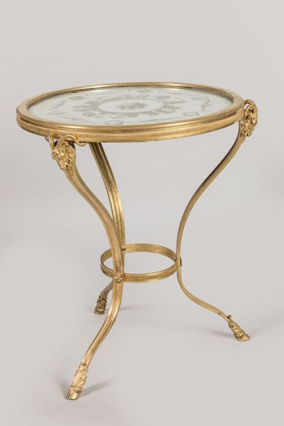 Chased-gilt bronze GUERIDON, the circular...