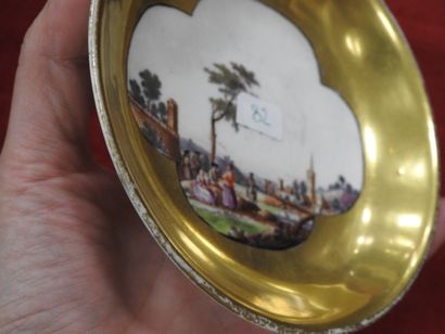 MEISSEN
Porcelain cup and saucer with polychrome...