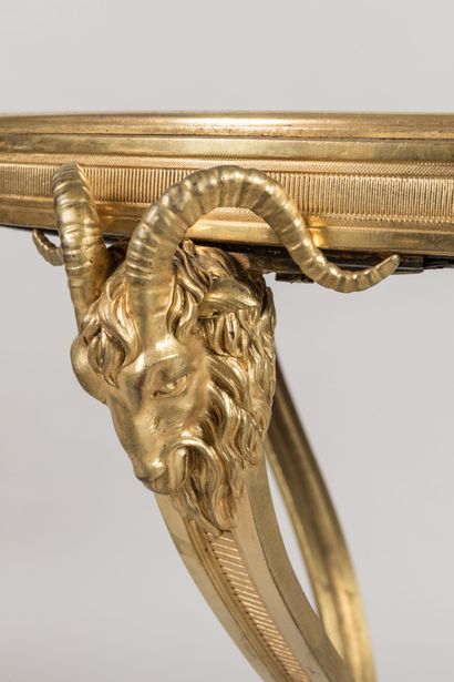 Chased-gilt bronze GUERIDON, the circular...