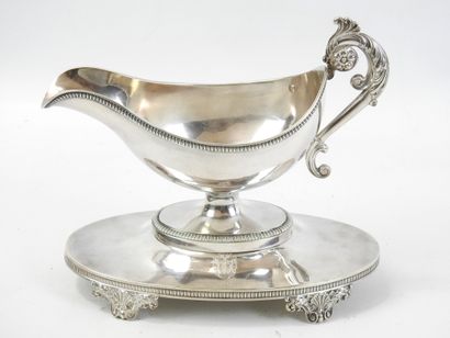 Silver helmet SAUCIERE standing on a four-legged...