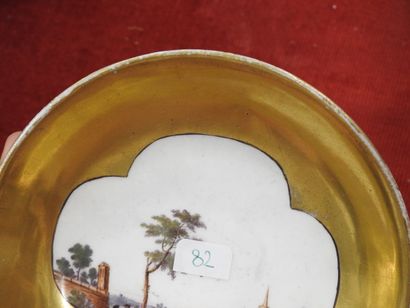 MEISSEN
Porcelain cup and saucer with polychrome...