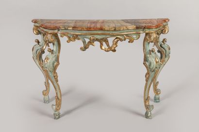 CONSOLE en bois sculpté, stuqué, laqué et...
