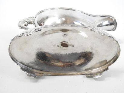 Silver helmet SAUCIERE standing on a four-legged...
