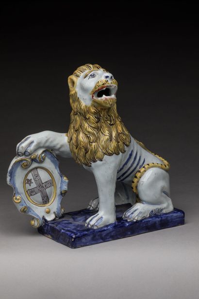 ROUEN: Seated polychrome earthenware lion,...
