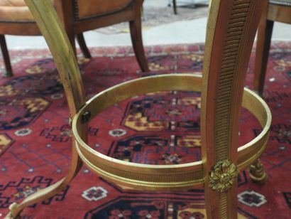 Chased-gilt bronze GUERIDON, the circular...