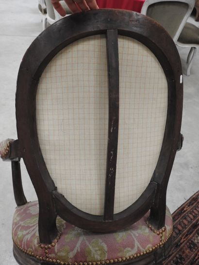 PAIR OF ARMCHAIRS in molded and carved natural...