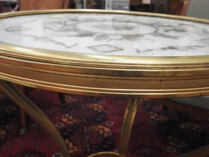 Chased-gilt bronze GUERIDON, the circular...