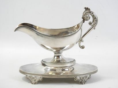 Silver helmet SAUCIERE standing on a four-legged...