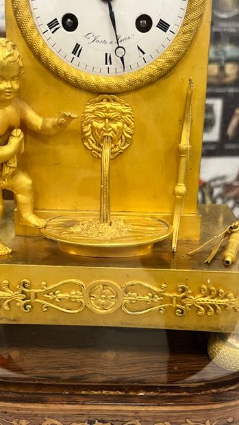 Gilt bronze HANGER with a cherub at a fountain,...