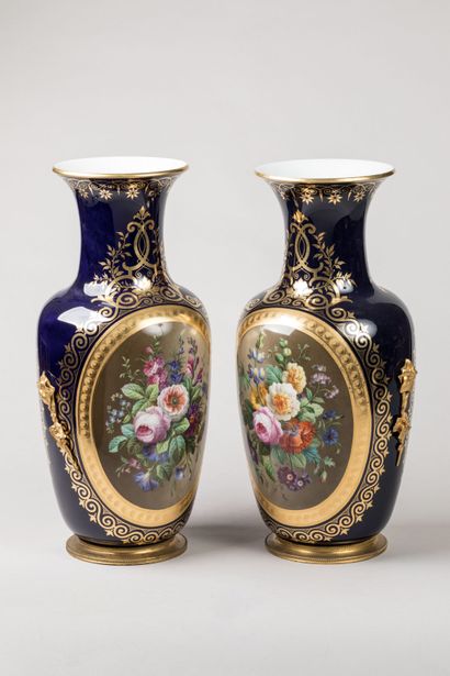 PARIS: Pair of mounted vases in polychrome...