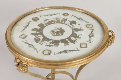 Chased-gilt bronze GUERIDON, the circular...