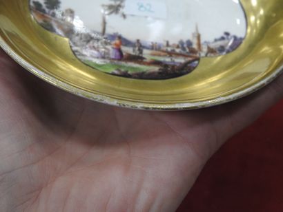 MEISSEN
Porcelain cup and saucer with polychrome...