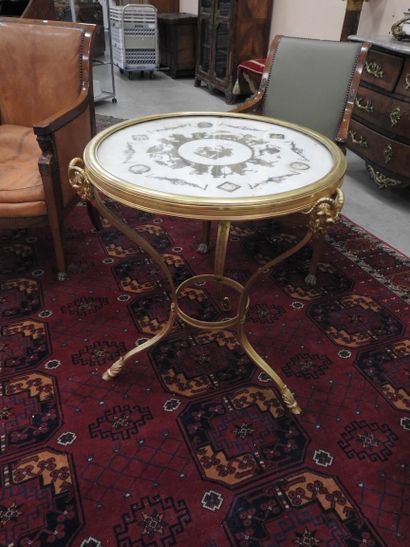 Chased-gilt bronze GUERIDON, the circular...