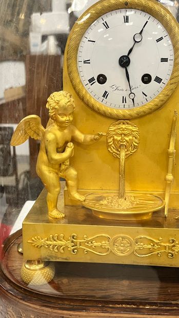 Gilt bronze HANGER with a cherub at a fountain,...