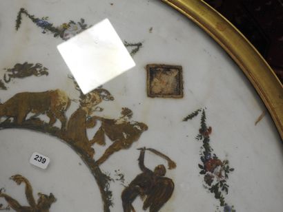 Chased-gilt bronze GUERIDON, the circular...