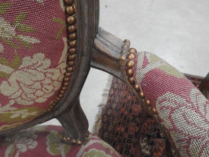 PAIR OF ARMCHAIRS in molded and carved natural...