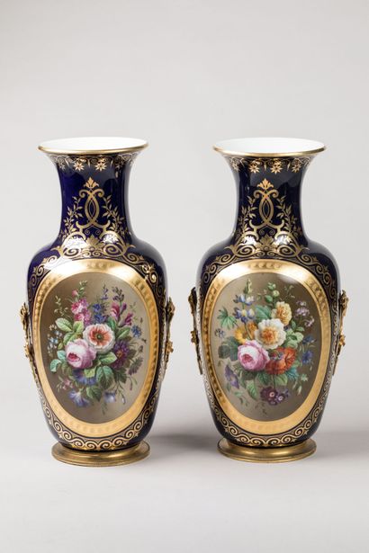 PARIS: Pair of mounted vases in polychrome...