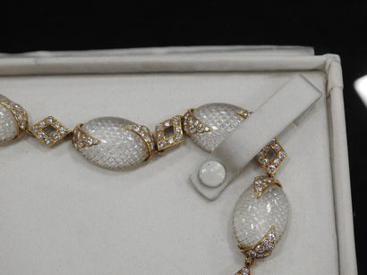 M. GERARD: Necklace in yellow gold 750 thousandths...