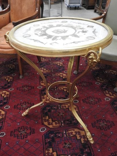 Chased-gilt bronze GUERIDON, the circular...