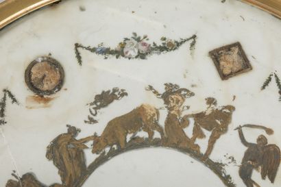 Chased-gilt bronze GUERIDON, the circular...