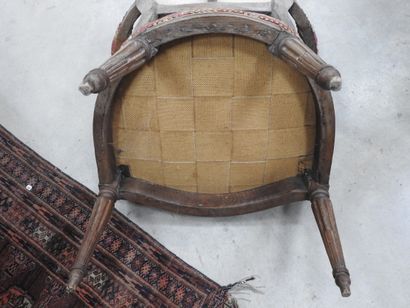 PAIR OF ARMCHAIRS in molded and carved natural...