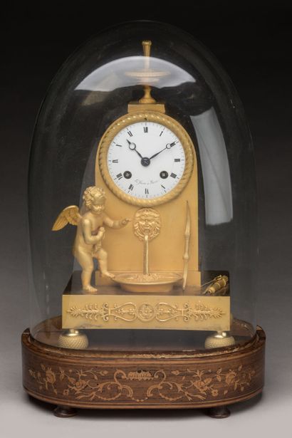 Gilt bronze HANGER with a cherub at a fountain,...