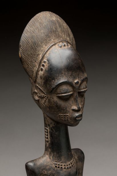 BAOULE, Cote d'Ivoire.
Bois sculpté et scarifié,...