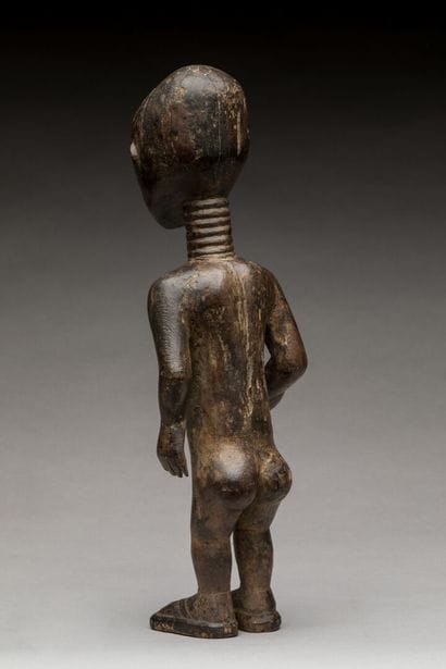 ABRON, région lagunaire, Côte d'Ivoire.
Statue...