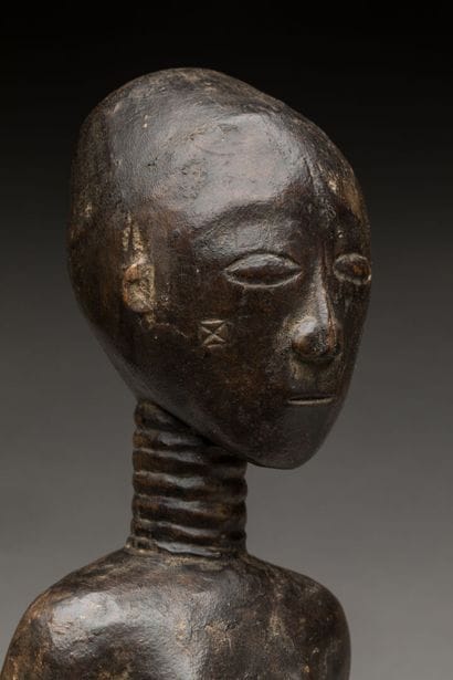 ABRON, région lagunaire, Côte d'Ivoire.
Statue...