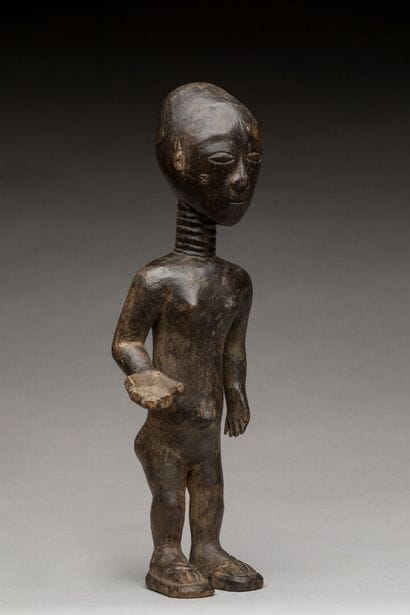 ABRON, région lagunaire, Côte d'Ivoire.
Statue...