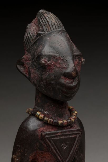 YOROUBA, Nigéria.
Bois dur, patine brun-foncé,...