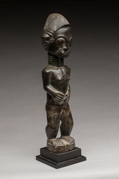 BAOULE, Côte d'Ivoire.
Bois dur, patine d'usage.
Statue...