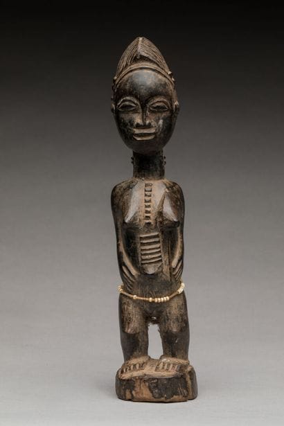 BAOULE, Côte d'Ivoire.
Bois dur, patine brun-noir,...