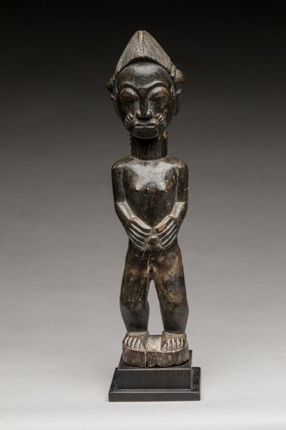 BAOULE, Côte d'Ivoire.
Bois dur, patine d'usage.
Statue...