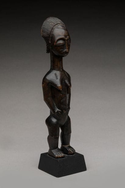 BAOULE, Côte d'Ivoire.
Bois dur, patine brun-foncé,...