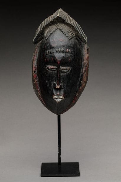 GOURO, Cote d'Ivoire.
Bois dur, patine noire,...