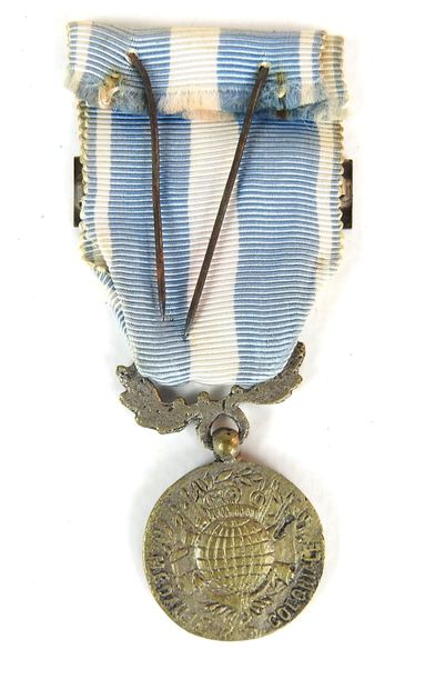 DECORATIONS. Médaille coloniale en bronze...