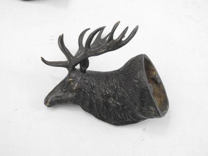 TWO DEER HEADS in brown patina bronze. Presented...