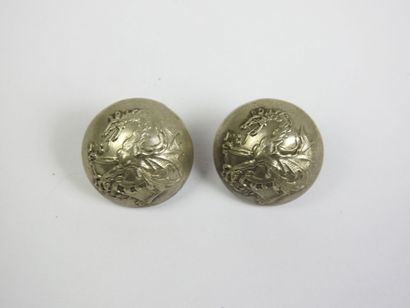 DELIVERY BUTTON. OO. Pair of outfit buttons...