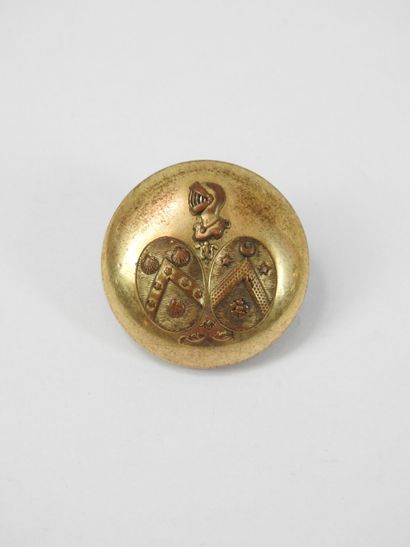 LIVERY BUTTON. Coat of arms under knight's...