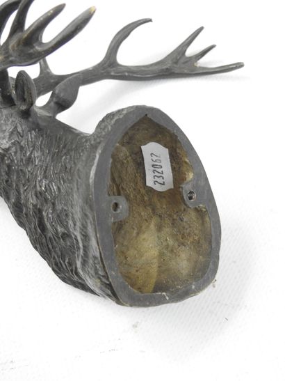 TWO DEER HEADS in brown patina bronze. Presented...