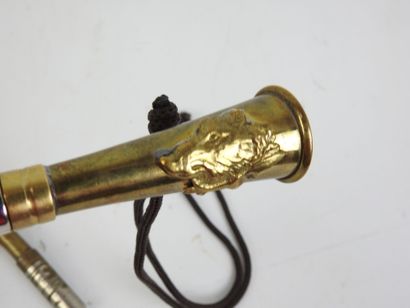 TWO brass PIBOLES, one decorated with a hure....