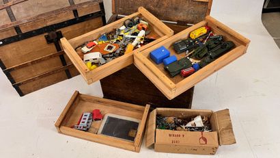 Wooden trunk containing three trays of plastic...