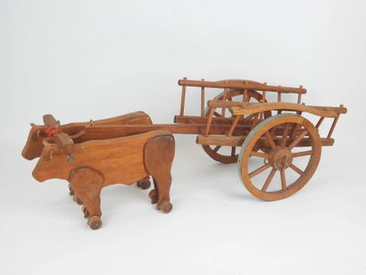 DEJOU. Charrette et ses deux boeufs en bois....