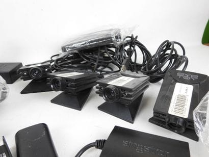 PLAYSTATION : 4 cameras Eye Toy et 10 caméras...